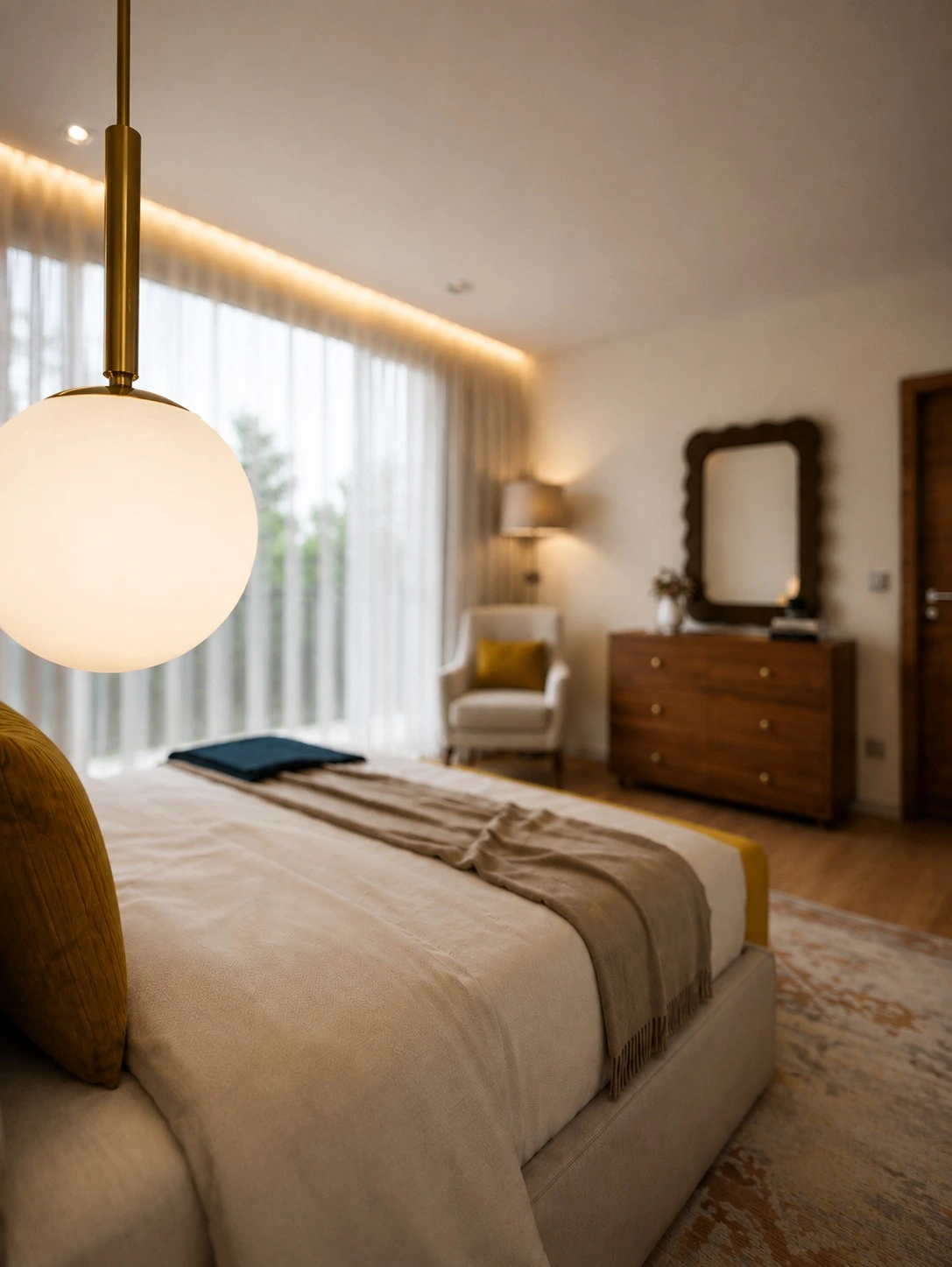 Suíte Master – detalhe de candeeiro pendente e cómoda em nogueira no projeto Cascais Residence